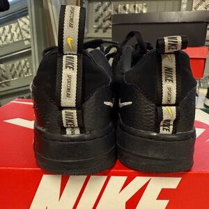 Nike Black Shoes with Yellow Details